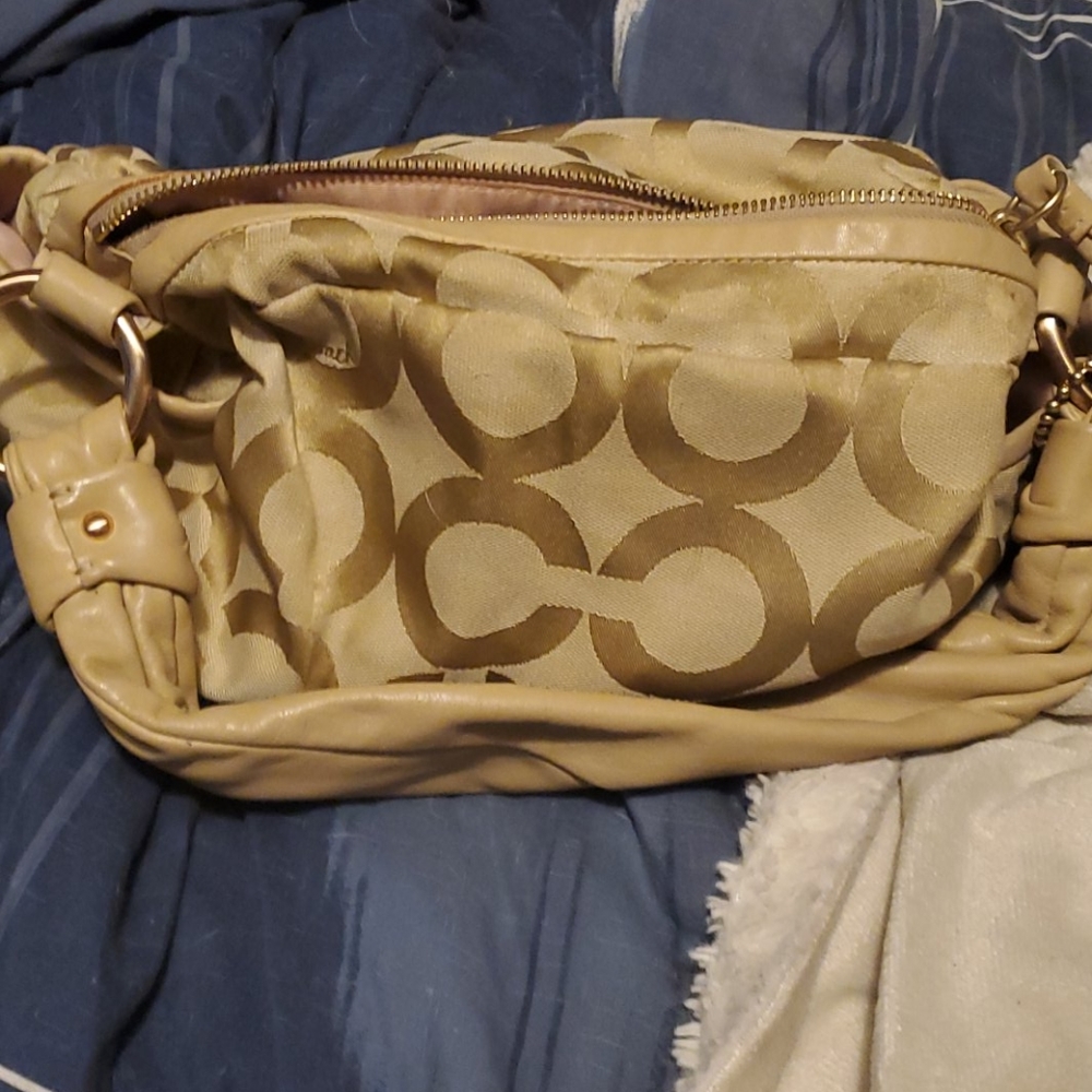 Small coach handbag.